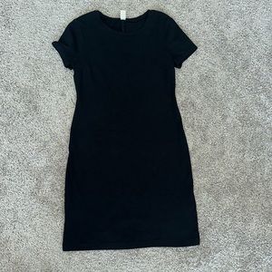 Black short sleeve fitted T-shirt dress. Size small.